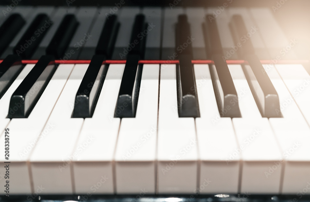 classic Piano keyboard closeup with warm light and selective focus, music instruments concept classic Piano keyboard closeup with warm light and selective focus, music instruments concept
