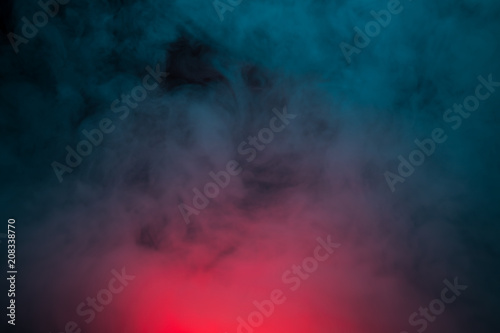 Colorful smoke on a black background closeup