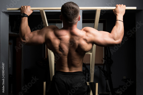 Male Athlete Doing Pull Ups