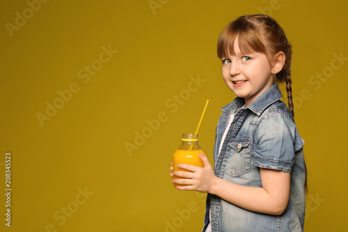 Cute little girl with citru...