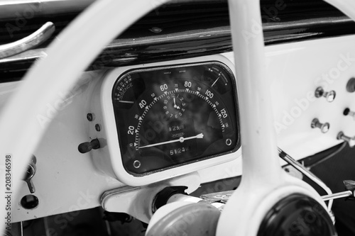 ISRAEL, PETAH TIQWA - MAY 14, 2016:  Exhibition of technical antiques. Steering wheel and dashboard in interior of old retro automobile in Petah Tiqwa, Israel