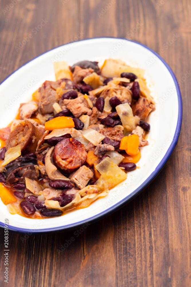 typical portuguese dish feijoada transmontana on white plate