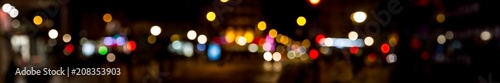 Bokeh traffic light at night in the street of a big city © sdecoret