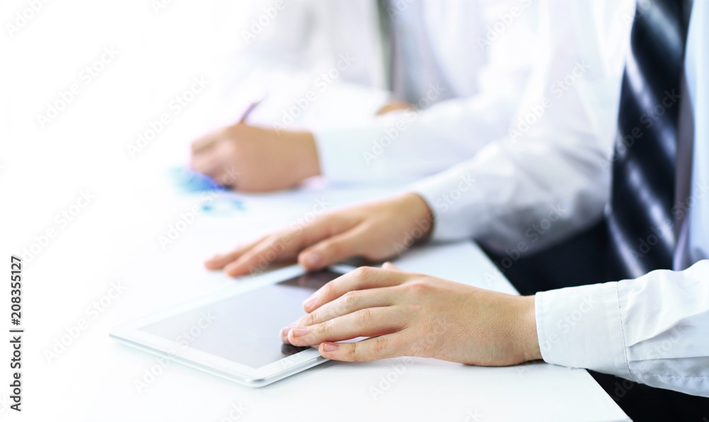 work of the team close-up of hands with tablet work of the team close-up of hands with tablet