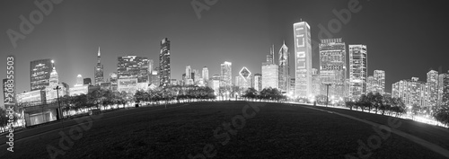Black and white fisheye lens picture of Chicago skyline at night, USA.