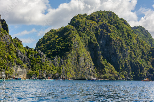 Rocky island in the sea. El Nido - Palawan, Philippines photo