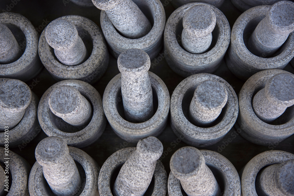 Black stone pestle and mortar, near Shore Temple, Mahabalipuram, Tamil