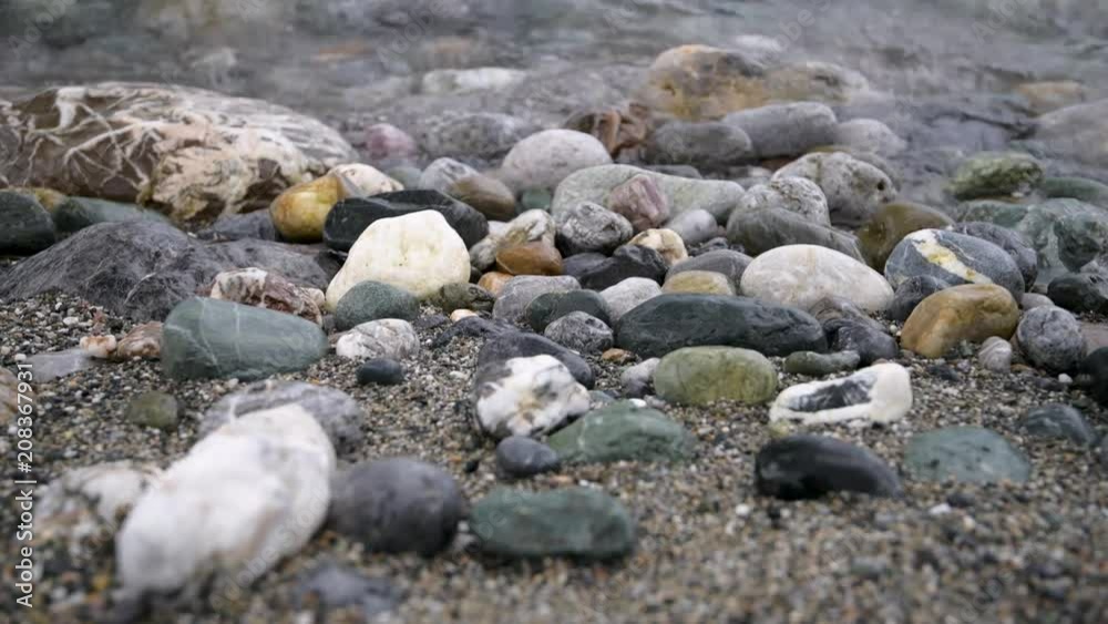 Aegean sea and stone on Prevelly beach, Crete island, Greece Aegean sea and stone on Prevelly beach, Crete island, Greece