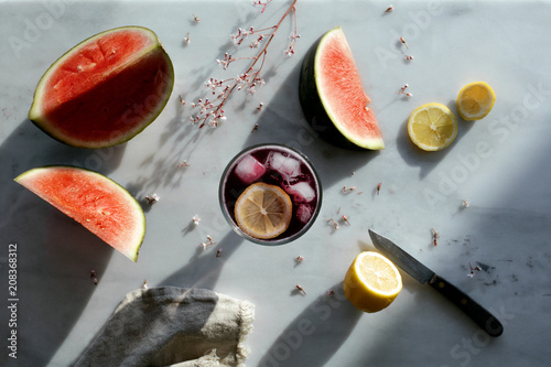 Overhead view of tinto de verano and watermelon on marble