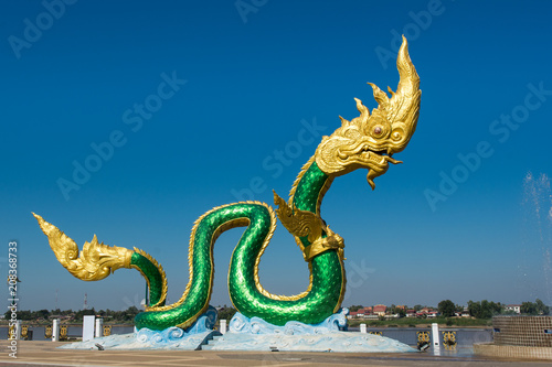 Naga statue in Buddhist temple Nhong kai Thailand photo