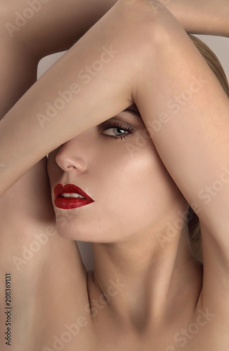 beautiful woman with red lips and blue eye