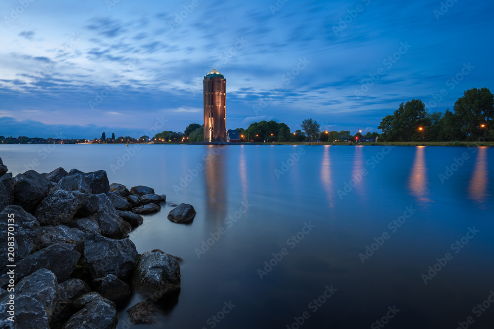 Illuminated water tawet from lake view