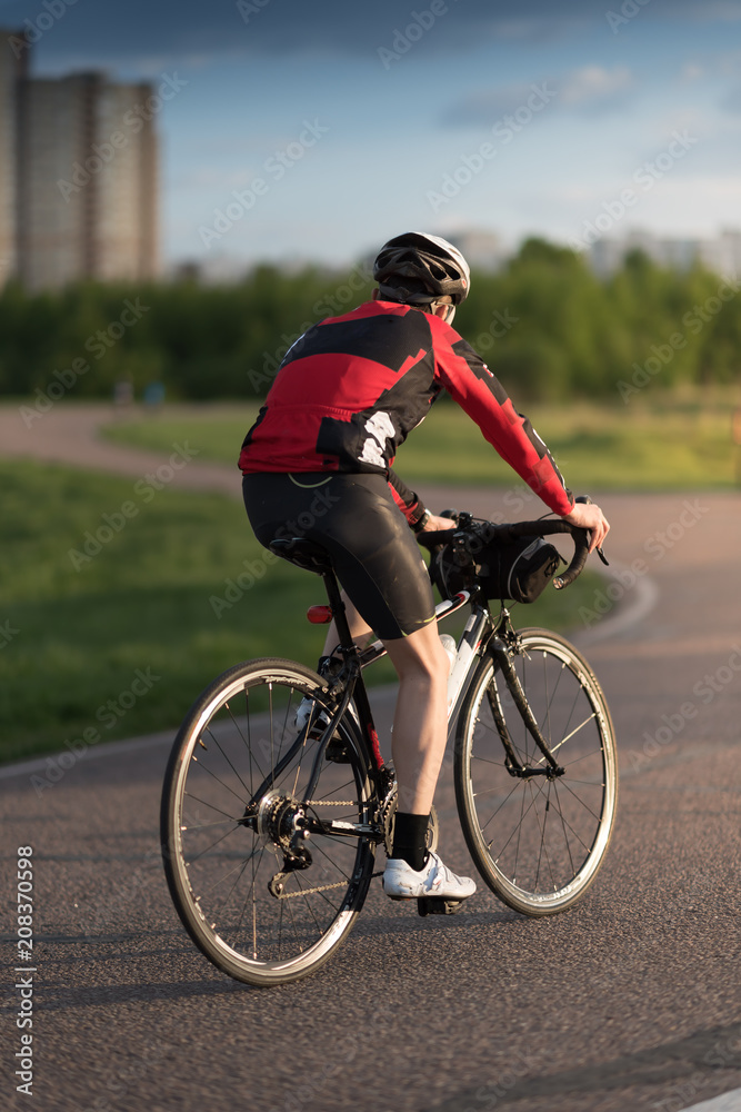 Cyclist in maximum effort in a road outdoors