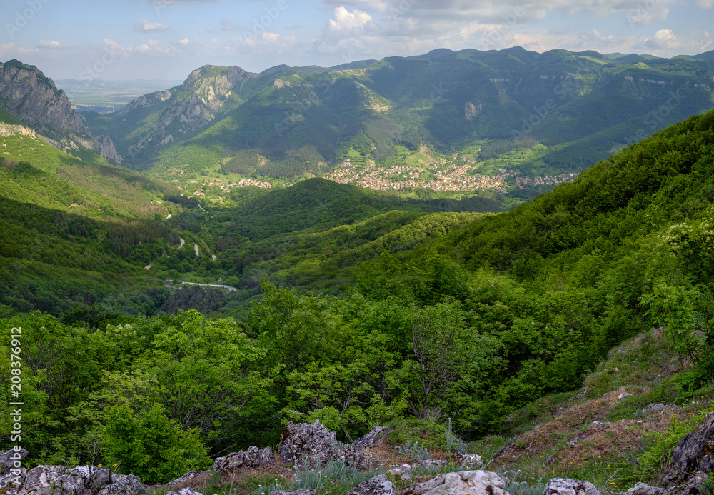 Panorama of a mountain village in the lowland