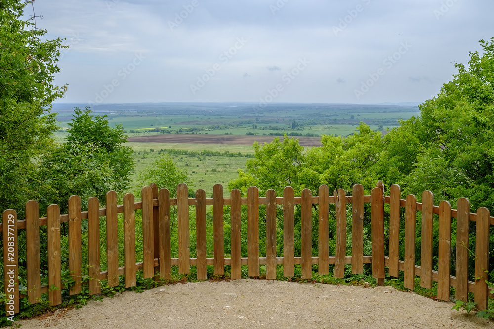 Authentic balcony fenced in a fence in the mountains