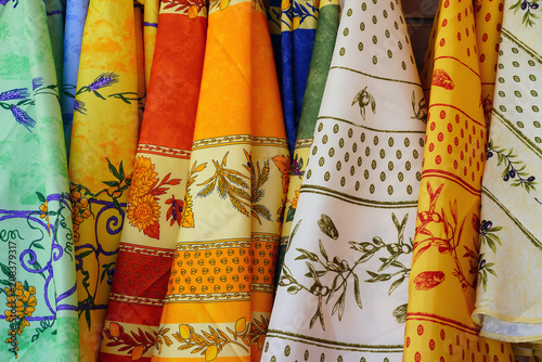 Colorful tablecloth with traditional Provencal fabrics with olive branches