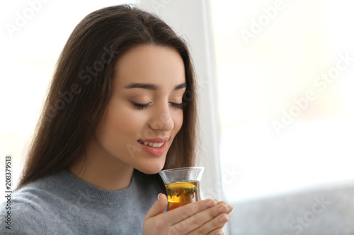 Beautiful young woman with ...