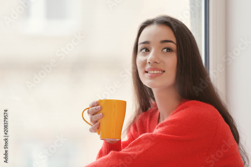 Beautiful young woman with ...