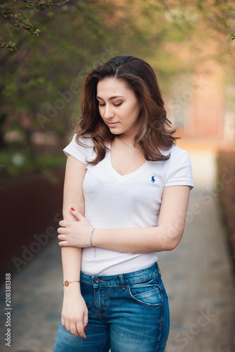 portrait of a beautiful young girl in the city center