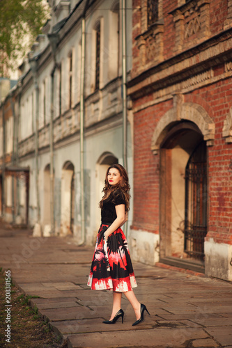 portrait of a beautiful young girl in the city center