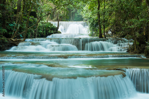 Fototapeta Naklejka Na Ścianę i Meble -  Huay Mae Khamin waterfalls in deep forest at Srinakarin National Park ,Kanchanaburi ,A beautiful stream water famous rainforest waterfall in Thailand