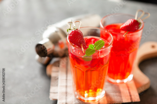 Red strawberry juice with fresh berries