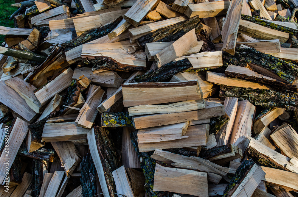 Chopped firewood. Harvesting firewood for the winter Chopped firewood. Harvesting firewood for the winter