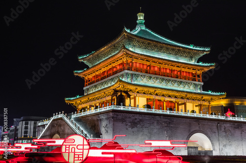 Famous Bell Tower in the Xi'an city, China. Xi'an is capital of Shaanxi Province and one of the oldest cities in China. Xi'an is the starting point of the Silk Road and home to the Terracotta Army. photo