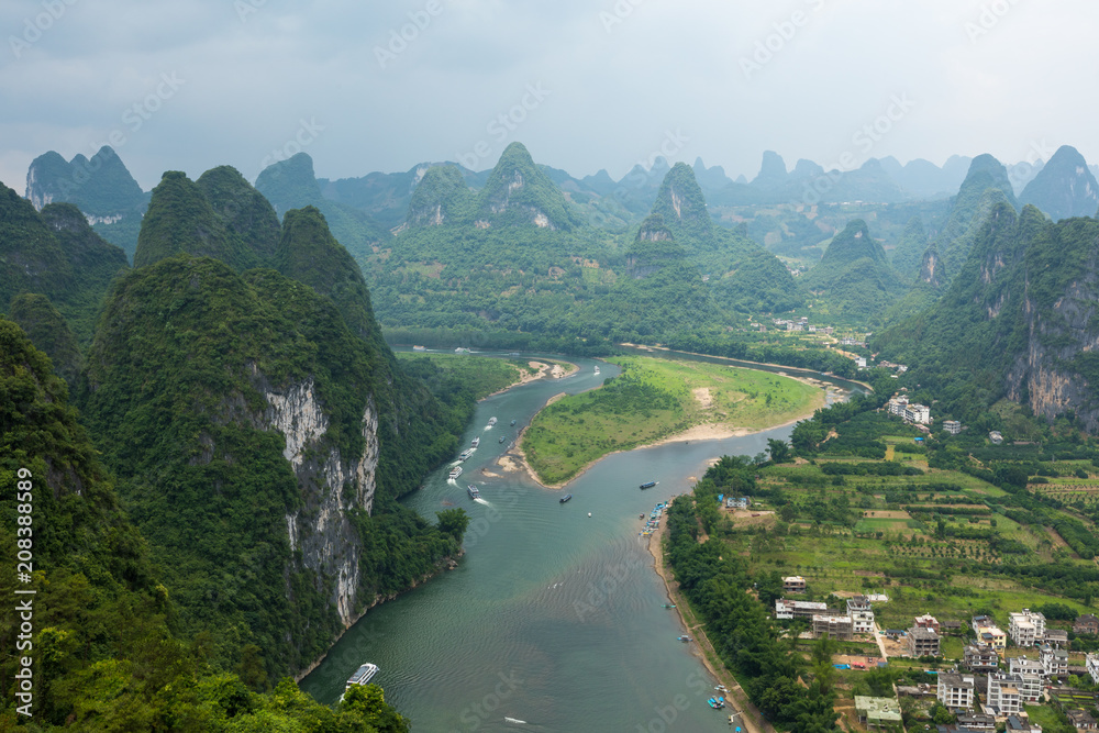 Landscape of Guilin, Li River and Karst mountains. Located near The Ancient Town of Xingping, Yangshuo, Guilin, Guangxi, China. Landscape of Guilin, Li River and Karst mountains. Located near The Ancient Town of Xingping, Yangshuo, Guilin, Guangxi, China.