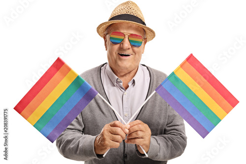 Mature man with rainbow flags