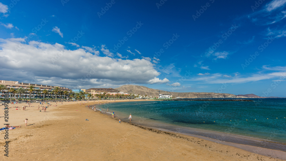 Famous beaches of Tenerife, Playa las Americas and Playas Del Camison on sunny day.