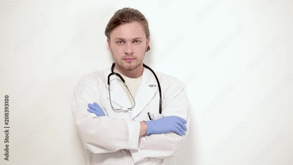 Portrait of vet in clinic. Crossed hands. Isolated on white background. Portrait of vet in clinic. Crossed hands. Isolated on white background.