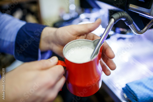 Photo of man with glass with milk and spoon