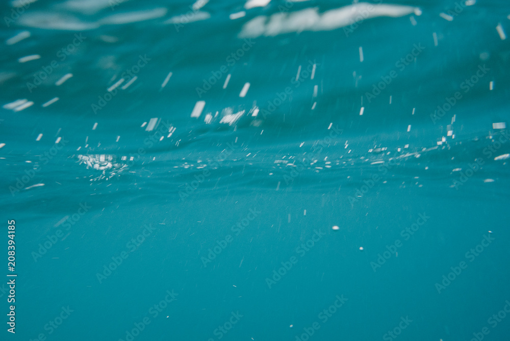 Water background of shine and reflect surface.