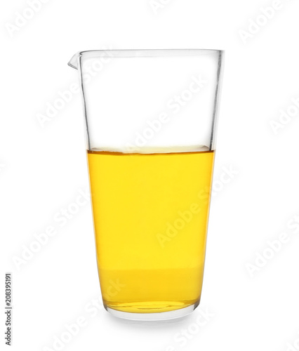 Beaker with yellow liquid on white background