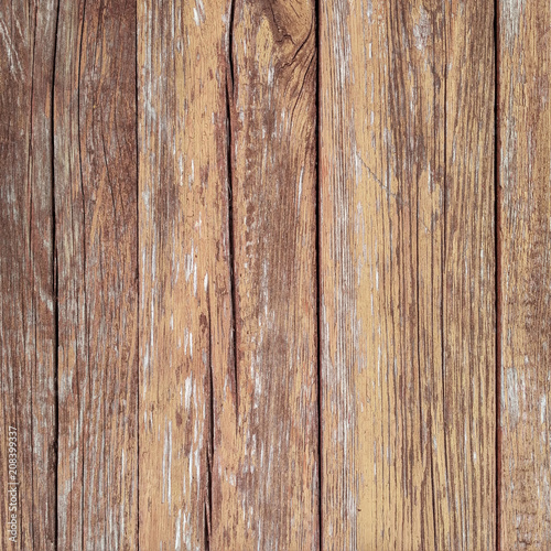Vertical cracked shabby wooden boards