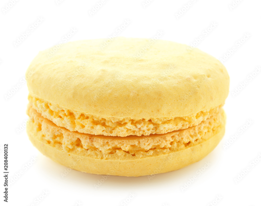 Delicious yellow macaron on white background Delicious yellow macaron on white background