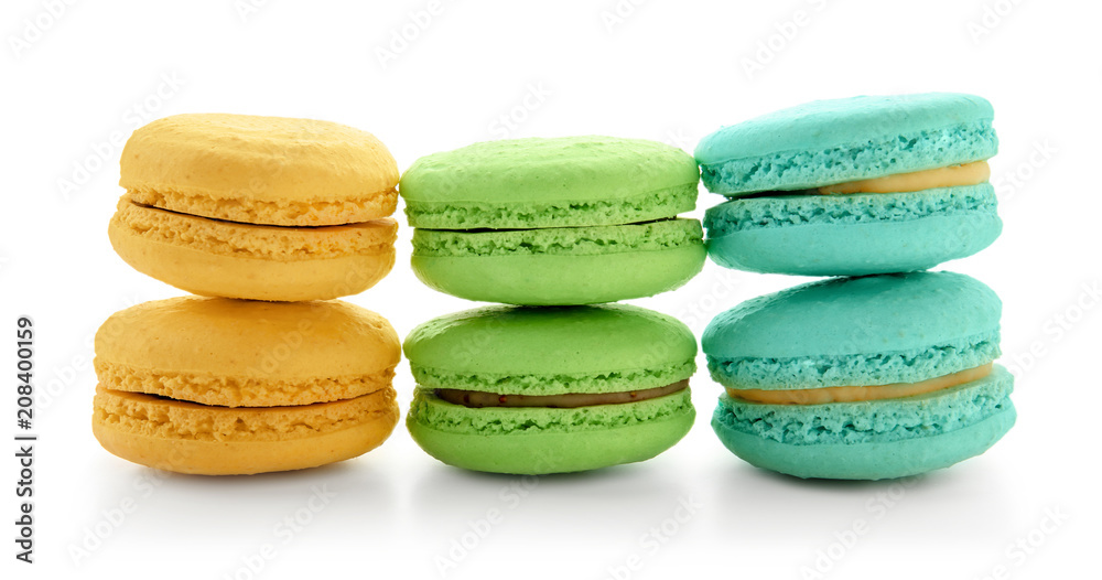 Delicious colorful macarons on white background Delicious colorful macarons on white background
