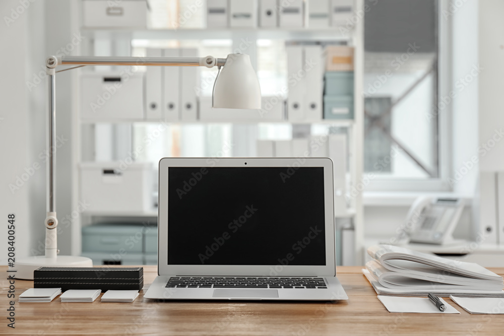 Fototapeta premium Stylish workplace with laptop on table