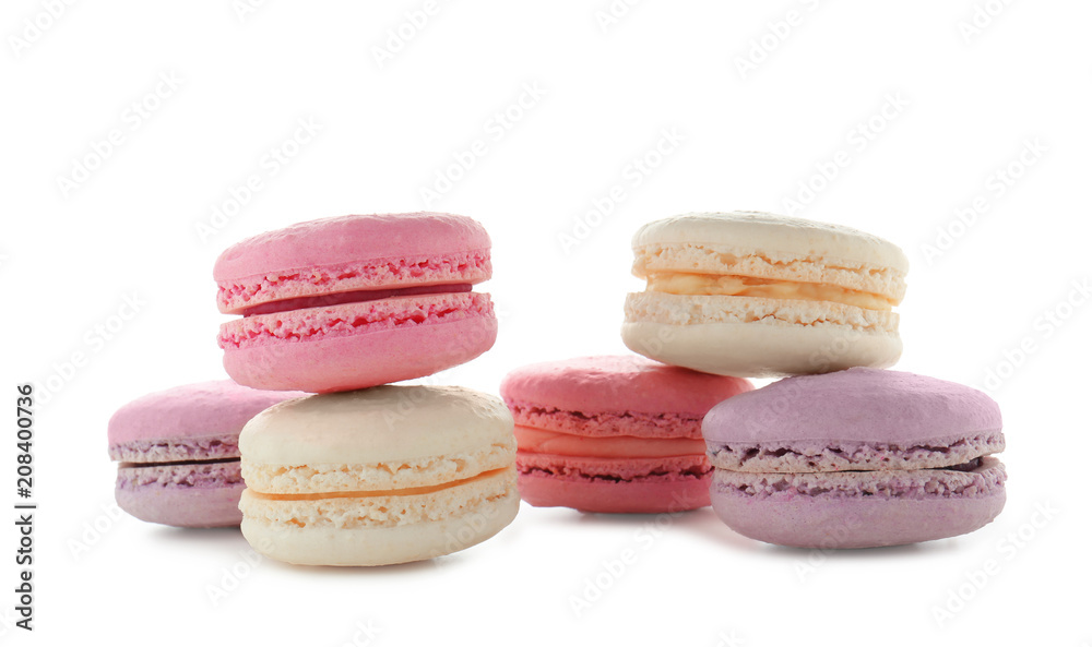 Tasty colorful macarons on white background Tasty colorful macarons on white background