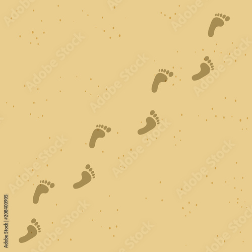 Human barefoot footprint path on yellow sand background.