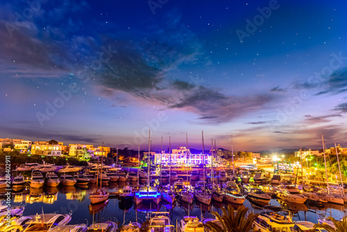 Cuadro en lienzo Panoramic night scene of Cala D`or port in Mallorca