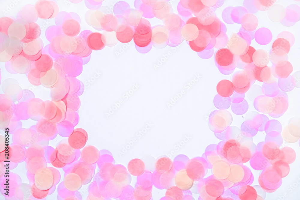 Colorful confetti border on white