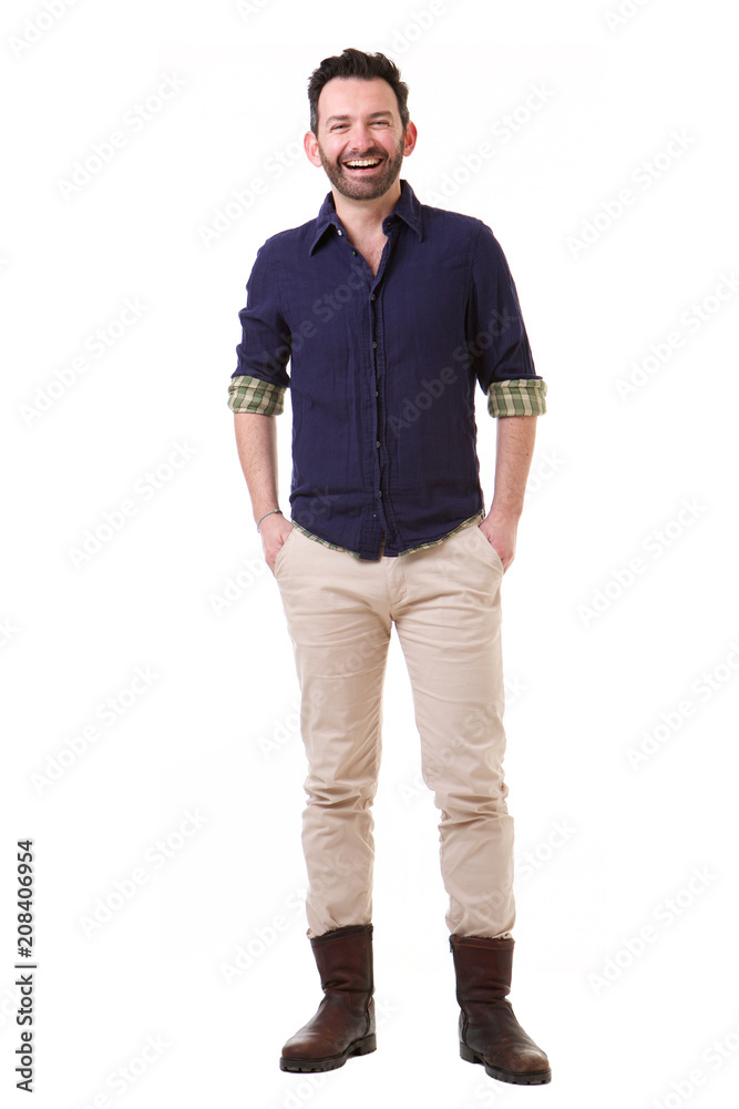 Fototapeta premium middle age man with beard laughing against isolated white background