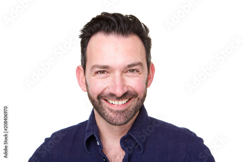 Close up of smiling man with beard against white background