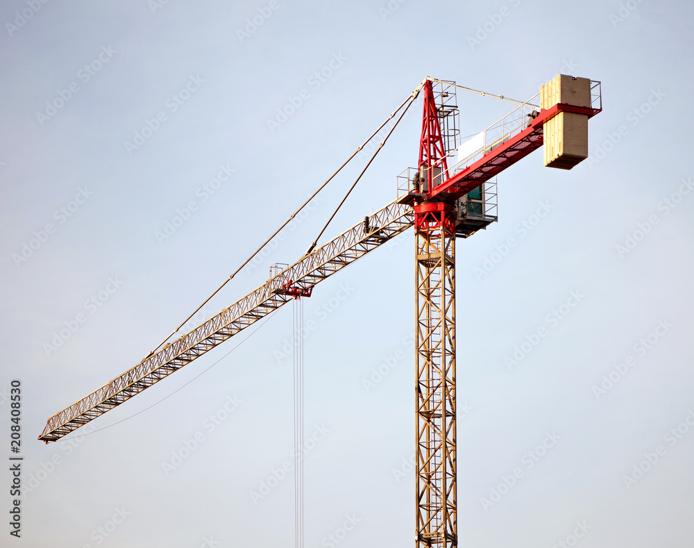 Construction cranes on construction sites. Construction cranes on construction sites.