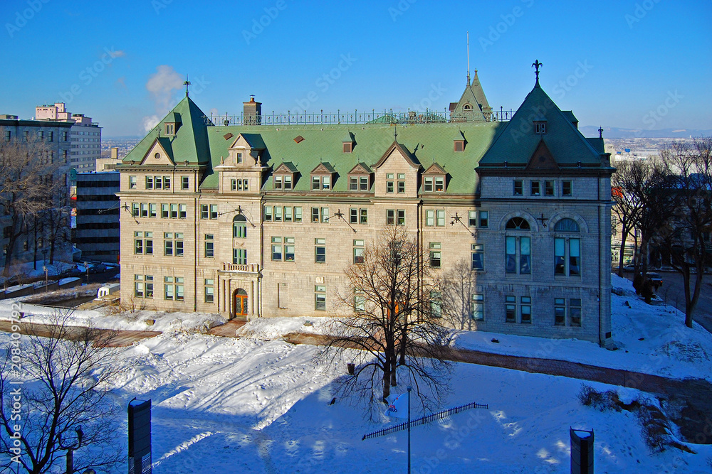 The Hotel de Ville City Hall in winter, Quebec City, Quebec, Canada. Historic District of Quebec City is UNESCO World Heritage Site since 1985.
