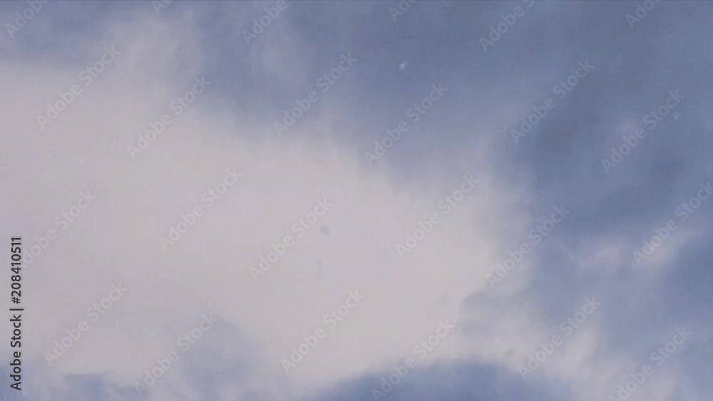Time-lapse of clouds through bedroom window on a beautiful sunny day Time-lapse of clouds through bedroom window on a beautiful sunny day