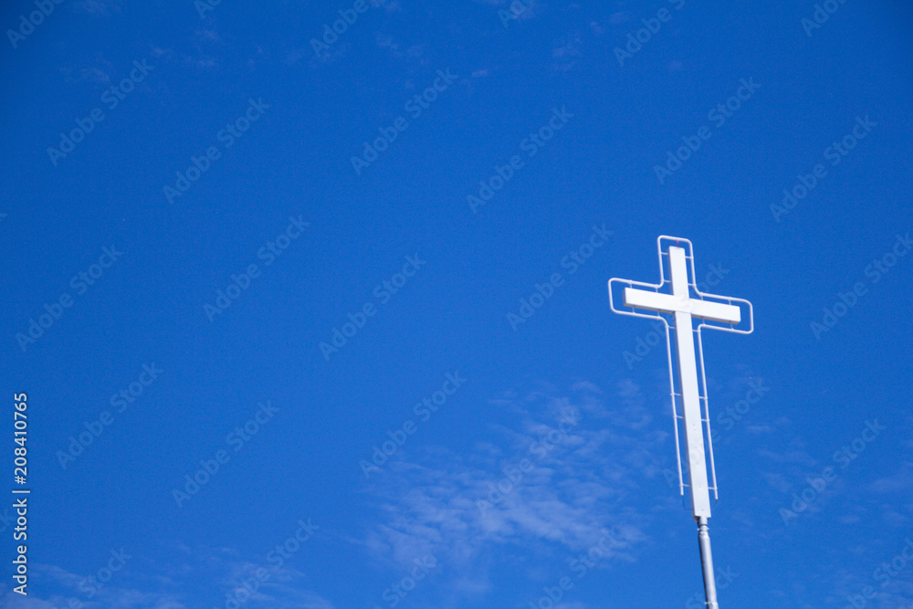 The white Cross with beautiful Blue sky.