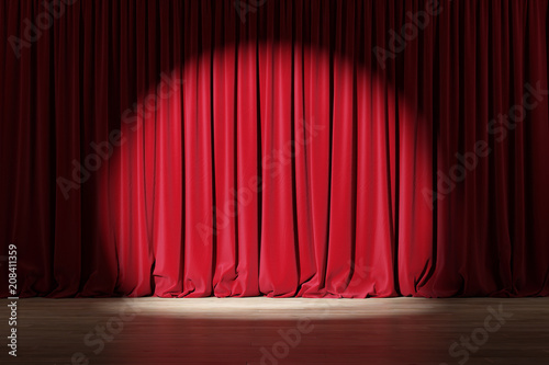 Empty stage with red velvet curtains with spotlight